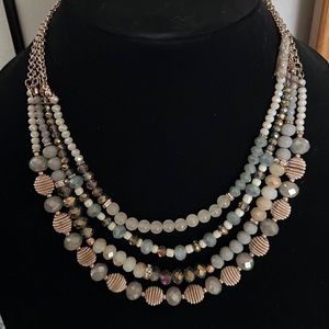 Multi-layered four strand glass and metal beaded necklace